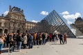 People Waiting in Long Queue at Louvre Museum in Paris France Royalty Free Stock Photo