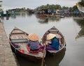 People waiting for passengers on Hoai river in Hoi An, Vietnam Royalty Free Stock Photo