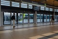 People waiting for Reseau express metropolitain (REM) train at station Brossard Royalty Free Stock Photo