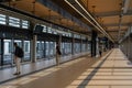 People waiting for Reseau express metropolitain (REM) train at station Brossard Royalty Free Stock Photo