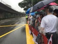 People waiting by side of road for the state funeral procession of ex prime minister of singapore Mr Lee Kuan Yew