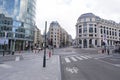 People waiting on stop in a empty street junction