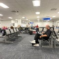 People waiting to board a planes at the Sanford International Airport in Sanford, Florida