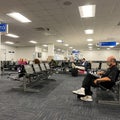 People waiting to board a planes at the Sanford International Airport in Sanford, Florida