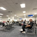 People waiting to board a planes at the Sanford International Airport in Sanford, Florida