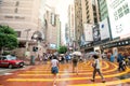 People waiting to cross through busy streets at Hong Kong Times Royalty Free Stock Photo