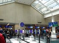 People waiting to go through TSA security screening a busy international airport