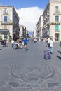 Via Etnea street and Etna volcano 