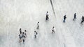 People walk on across business city street Aerial top view Royalty Free Stock Photo