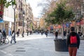 People walk along the Barcelona promenade in time of Covid 19 in winter 2021