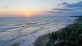 People walk along Echo Beach before sunset. Aerial Shot Of Tourists enjoy time before sunset at the popular beach in Royalty Free Stock Photo