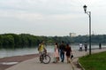 People walk along the embankment in the Moscow estate Kolomenskoye