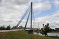 People walk along the longest pedestrian bridge in Europe in Sremska Mitrovica, crossing the river Sava