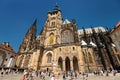 People walk around St. Vitus Cathedral