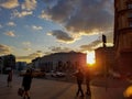 People walk during beautiful sunset on Lubyanka square