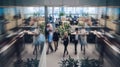 Busy Office Workers Moving Through Modern Office Space During the Day Royalty Free Stock Photo