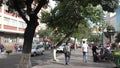 People walk in the commercial Prado Street in La Paz