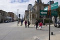 People walk at the central square of Punta Arens, Chile. Royalty Free Stock Photo