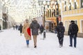 People walk in city streets under snowall b Royalty Free Stock Photo