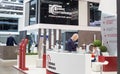 People walk in different stands and sections at the International exhibition of transport and logistics services