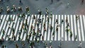 People walk face recognition technology concept of big data and security in city. Aerial view of pedestrians walk at Shibuya Cross