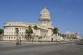 People walk in front of the Capitolio building in Havana, Cuba.