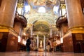 People walk inside the beautiful library