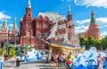 People walk on Manezhnaya Square by Moscow Kremlin, Russia Royalty Free Stock Photo