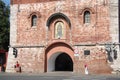 People walk near Dmitrovskaya Tower, Nizhny Novgorod Kremlin