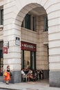 People walk past Pret A Manger shop in City of London, London, UK. Royalty Free Stock Photo