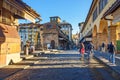 People walk on Ponte Vecchio Bridge at morning. Florence. Italy Royalty Free Stock Photo