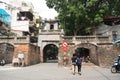 People walk through Quan Chuong Gate, Hanoi