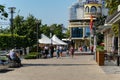 People walk and relax on beautiful alleys of  embankment of Rostov-on-Don. Sunny warm day Royalty Free Stock Photo