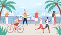 People walk on sea quay. Family and couple tourist at vacation look at sail boats. Seaside summer travel in tropic shore Royalty Free Stock Photo