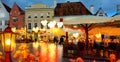 Gold Autumn Tallinn rainy evening city holiday light blurring Street cafe bokeh g city light evening restaurant table cup of c