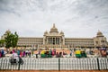 People walking across Vidhana Soudha