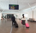 People walking at the airport in Bali, Indonesia Royalty Free Stock Photo