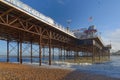 Brighton, england: cold tourists on the pier. blue sky Royalty Free Stock Photo