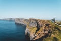 people walking along the cliffs of moher Royalty Free Stock Photo