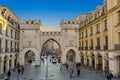 People walking along through the Karlstor gate