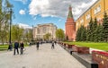 People walking along of the Kremlin walls in Alexander garden. Royalty Free Stock Photo