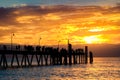 People walking along pier at Glenelg