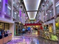 People walking along the promenade on the Royal Caribbean Cruise Ship Mariner of the Seas Royalty Free Stock Photo