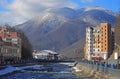 People are walking along riverside Mzymta in Krasnaya Polyana