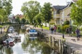 People walking along Trosa river