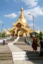 People walking in the area of the Maha Wizaya Paya Pagoda in Yangon