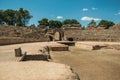 People walking around the arena of Roman Amphitheater at Merida