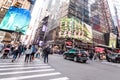 People walking around Times Square buildings in New York City, twillight Royalty Free Stock Photo