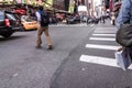 People walking around Times Square buildings in New York City, twillight Royalty Free Stock Photo