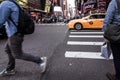 People walking around Times Square buildings in New York City, twillight Royalty Free Stock Photo